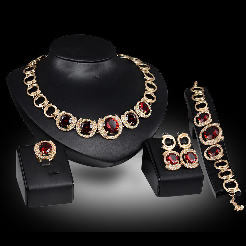 Hersteller liefert Goldschmuck vier Sets, blauer Edelsteinschmuck, Hochzeitsschmuck, Damenbankett Schmuckset