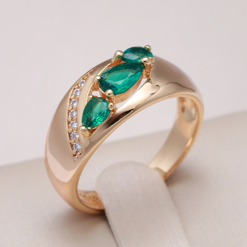 Roségold Damenring mit grünem Zirkon – schlichtes Design