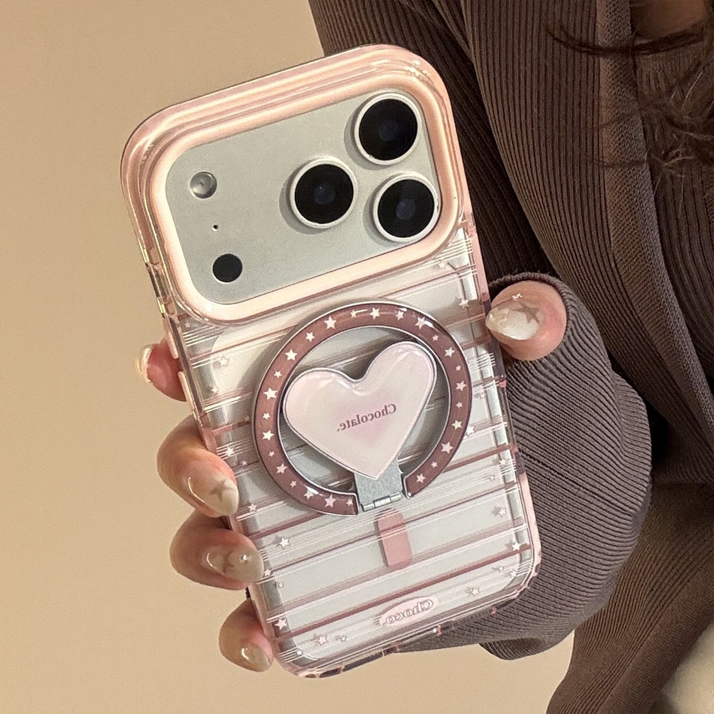 „Magnetischer Halter, kompatibel mit Rosa-Braun gestreiften Schutzhüllen.“